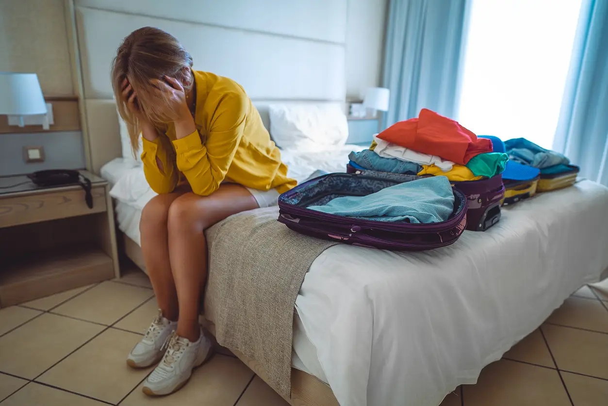 woman-sick-overseas-holiday