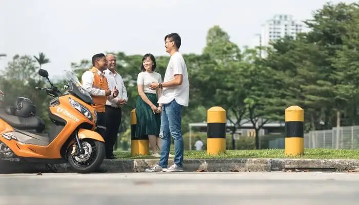 woman checking her mirror in car