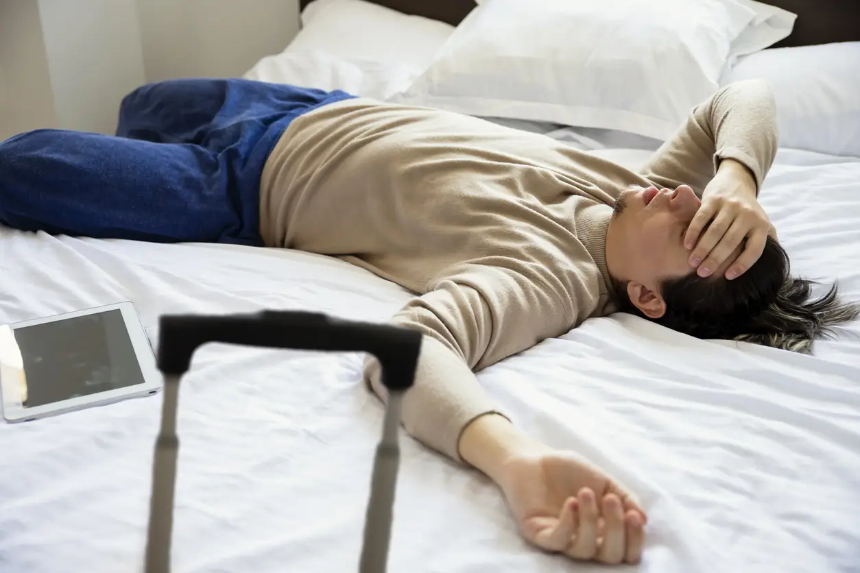 man-sick-overseas-holiday