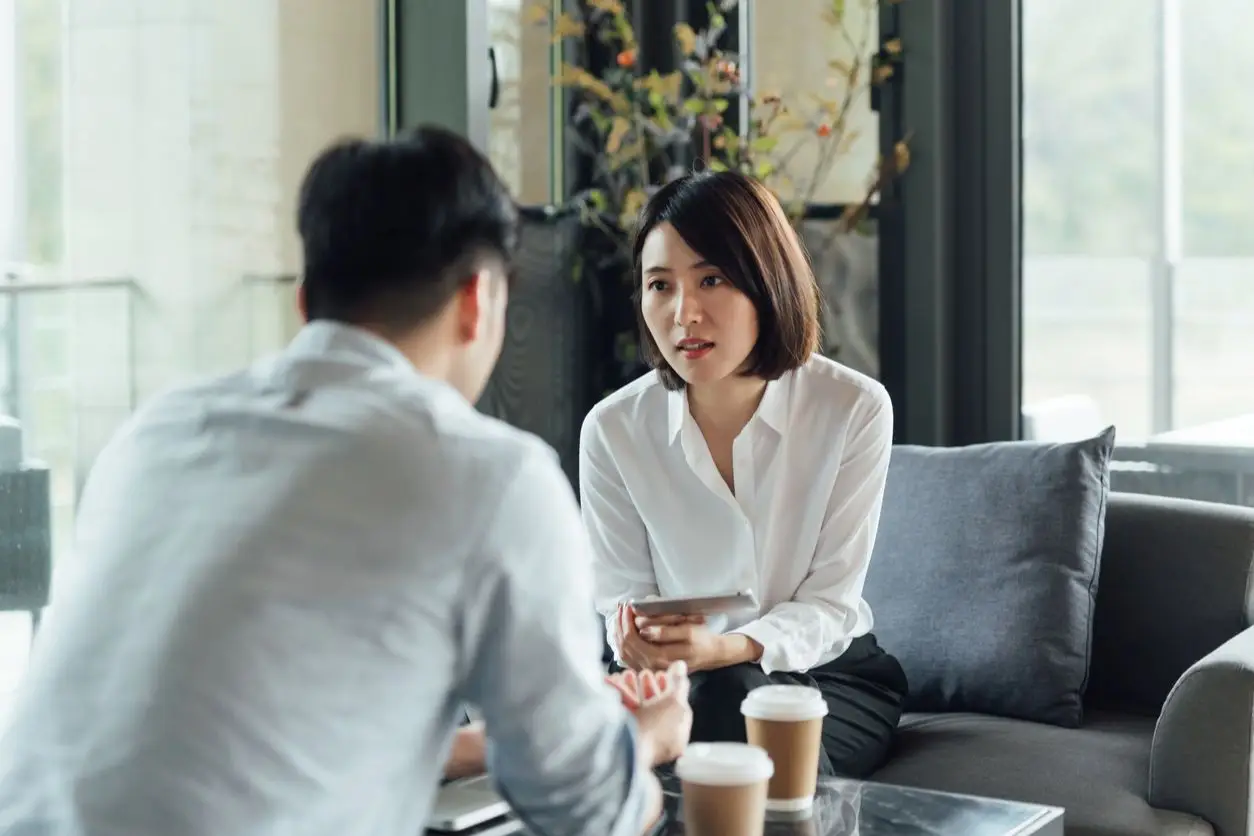 woman talking to man