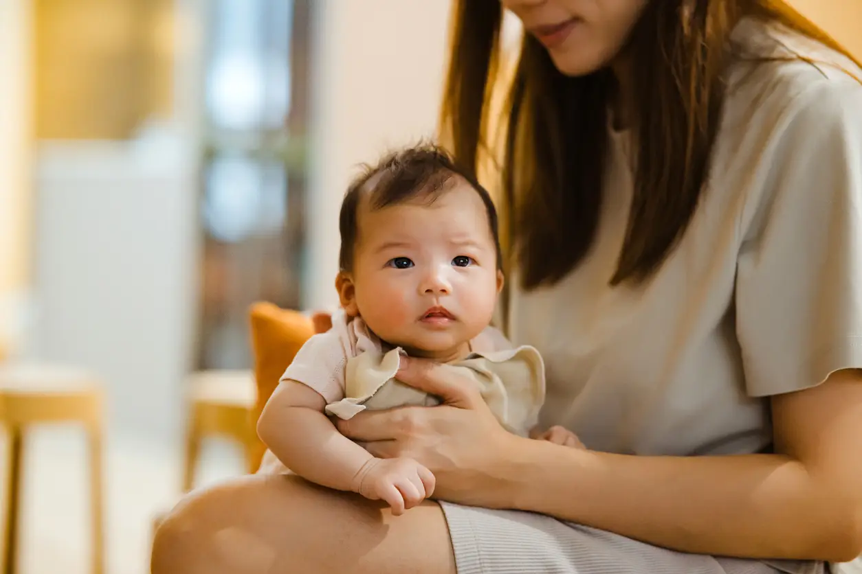 woman-burping-baby woman-burping-baby