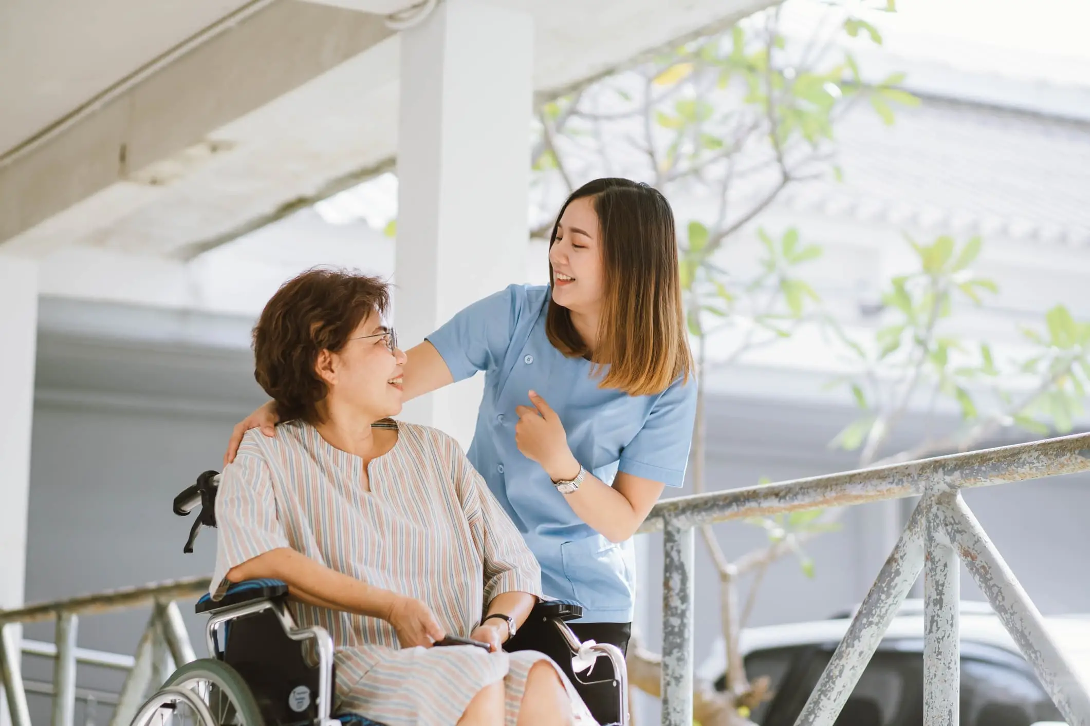 Lady in wheelchair with nurse​