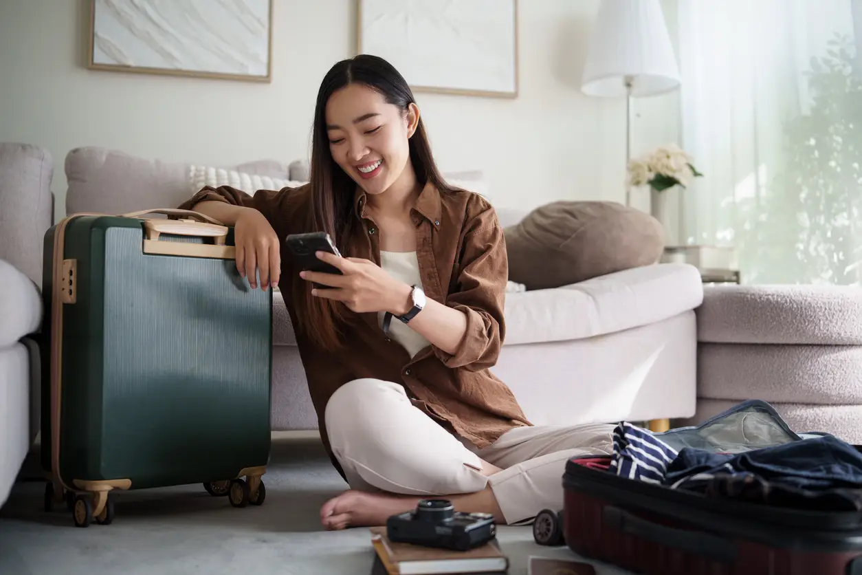 woman-and-phone-flexible-travel-plans