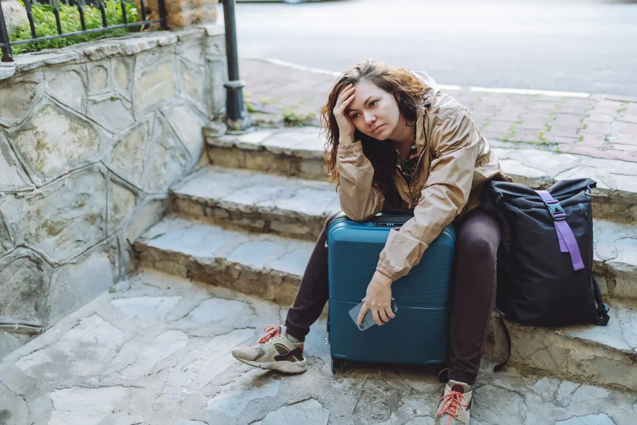 woman-with-luggage-travel-insurance woman-with-luggage-travel-insurance
