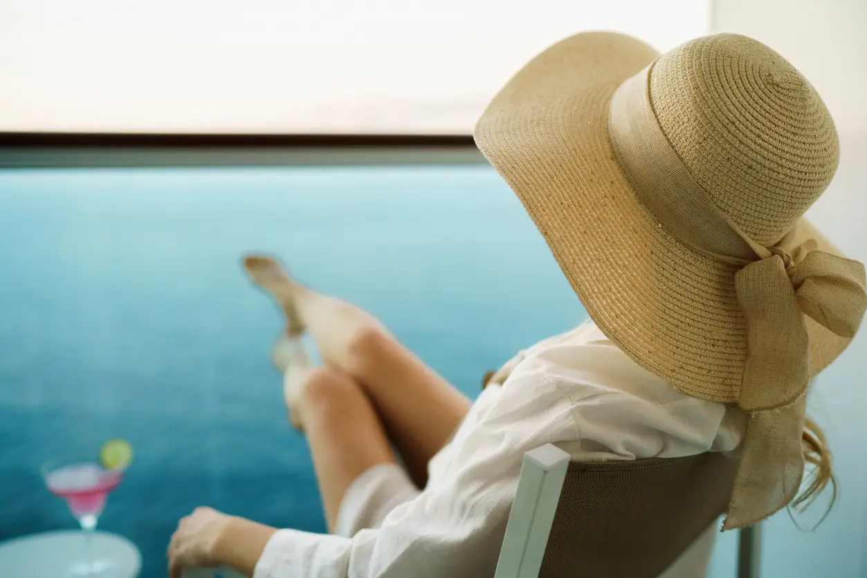 woman-on-cruise-travel-balcony woman-on-cruise-travel-balcony