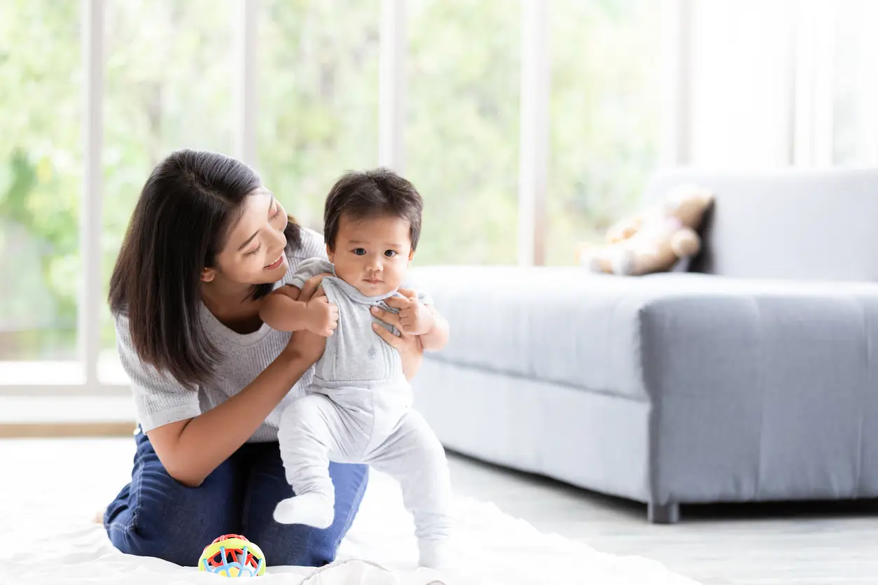 domestic-helper-and-baby-walking domestic-helper-and-baby-walking