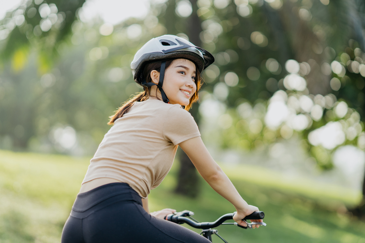 woman preparing to cycle