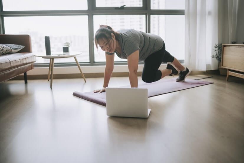 Woman doing yoga at home