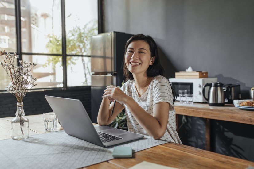 woman with laptop at home