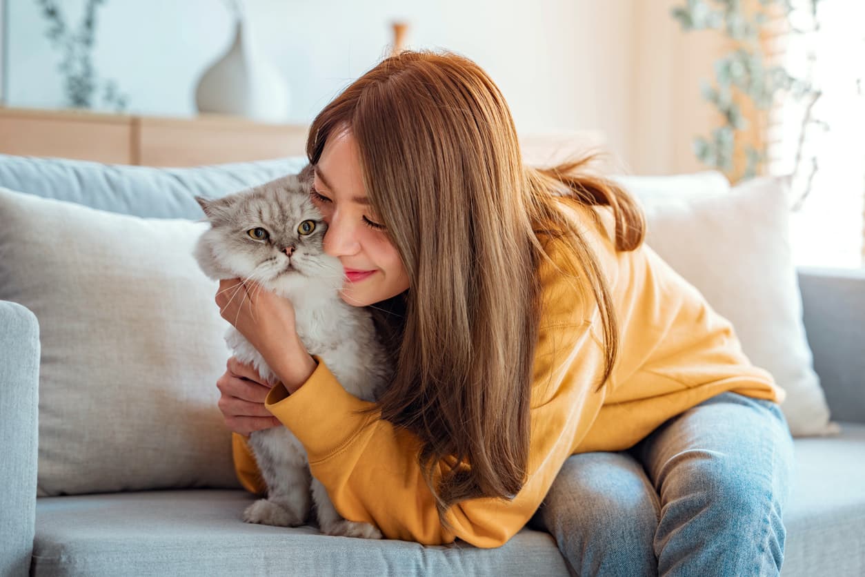 woman with her pet cat