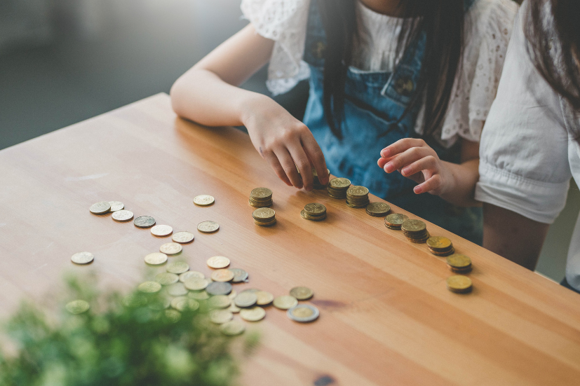 Mother & Daughter Counting Coins