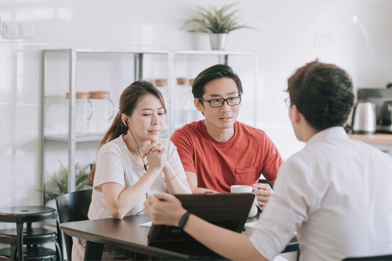 couple talking to financial advisor
