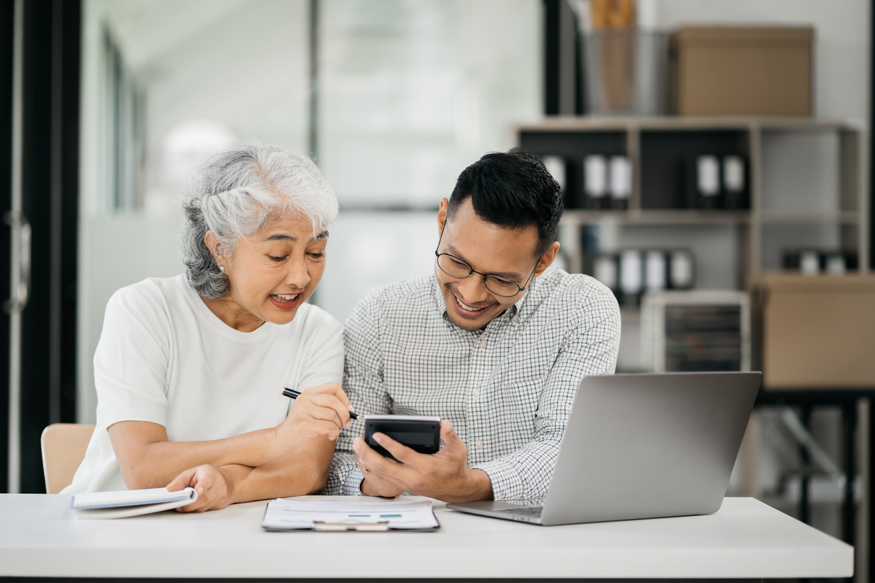 elderly discussing insurance